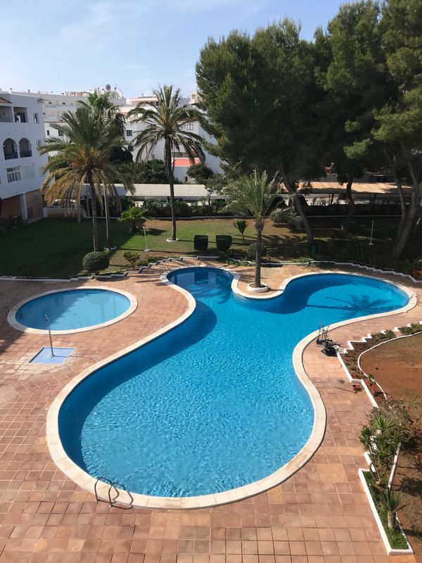 IBIZA: Cozy (1BR) apartment next to the beach and hippy market, big shared swimming pool and garden!